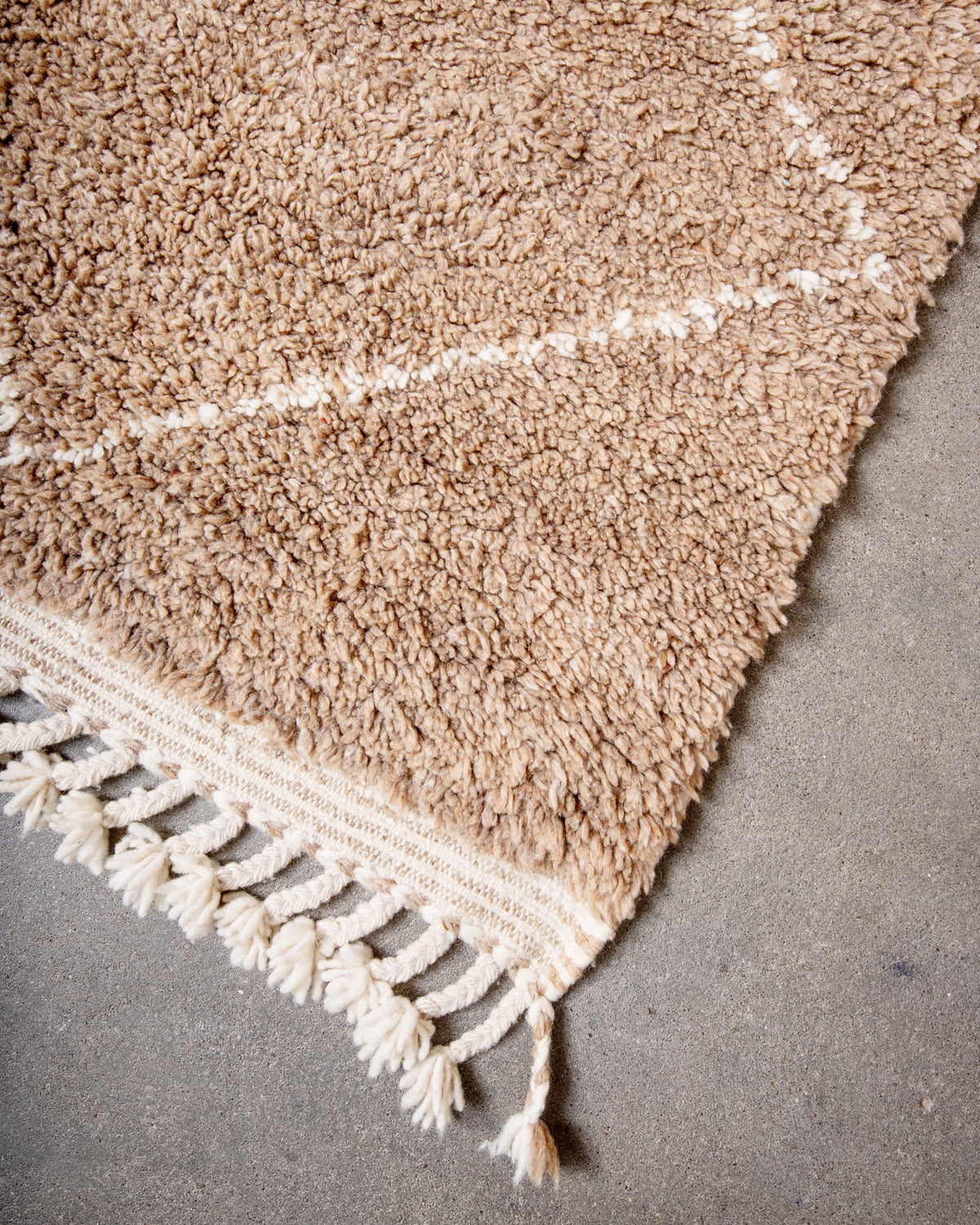 Modern, designer, handcrafted Berber rug from Morocco. Beniourain carpet with beautiful colours and patterns and fluffy wool texture.